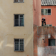 A man paints his house in Pyongyang.